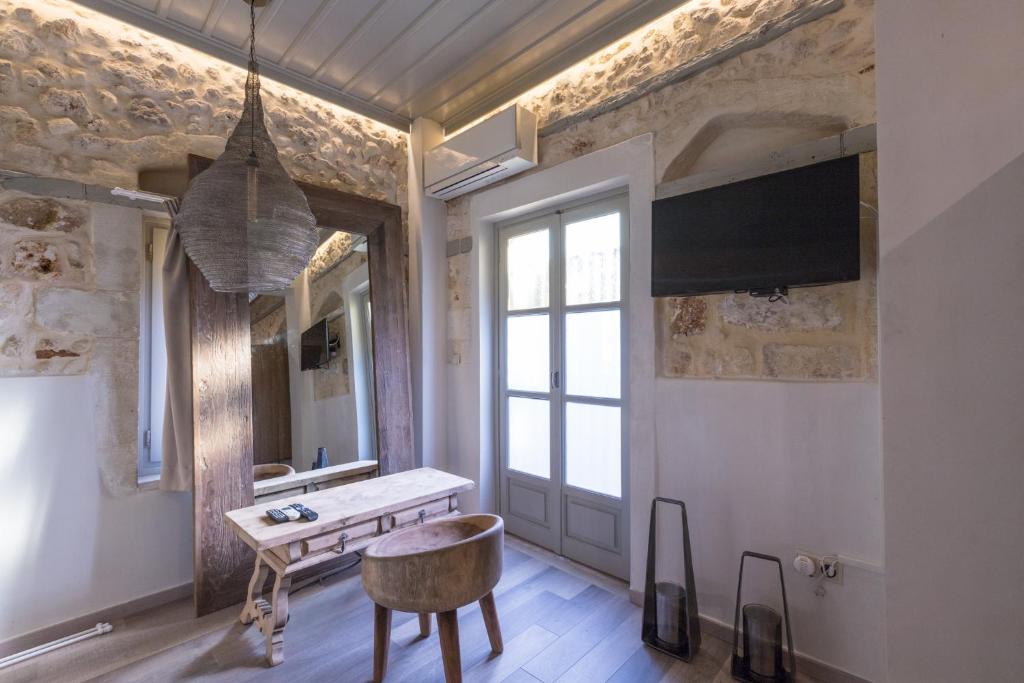 TV a/nebo společenská místnost v ubytování Casa Vitae Villas