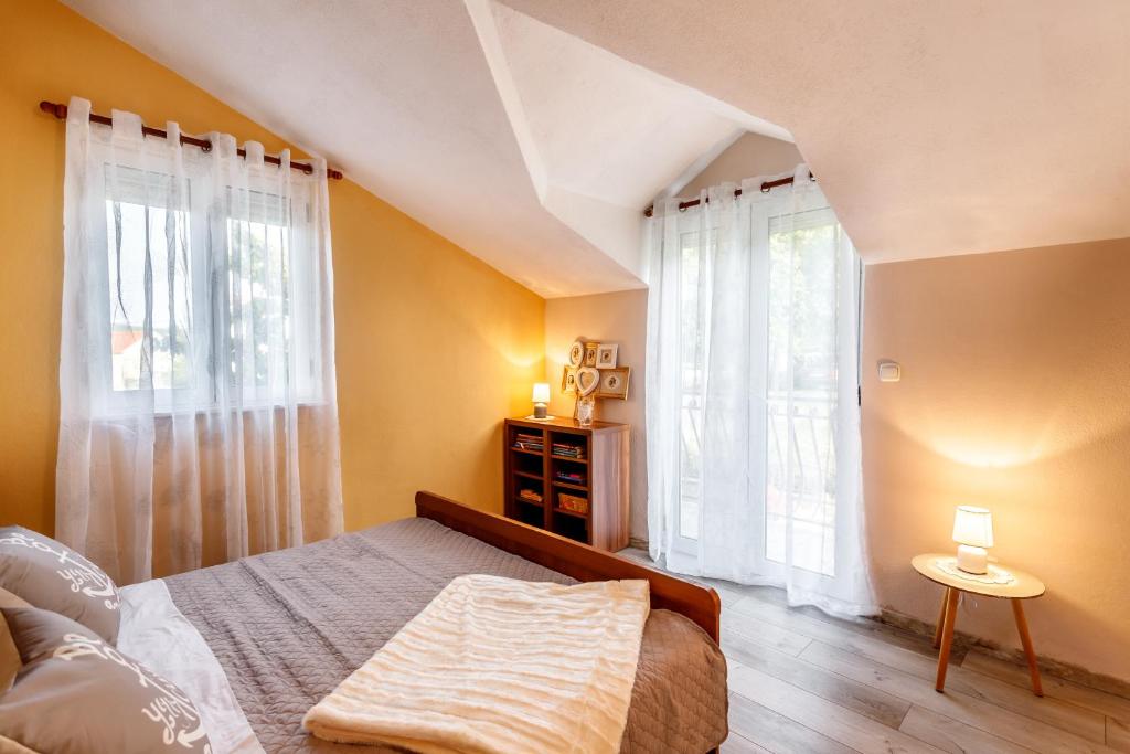 Posteľ alebo postele v izbe v ubytovaní Holiday home Memories and Joy