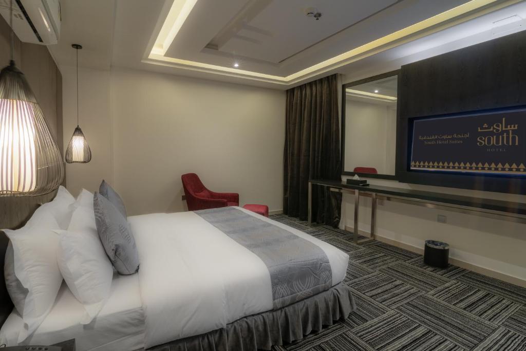 TV a/nebo společenská místnost v ubytování South Hotel Suites