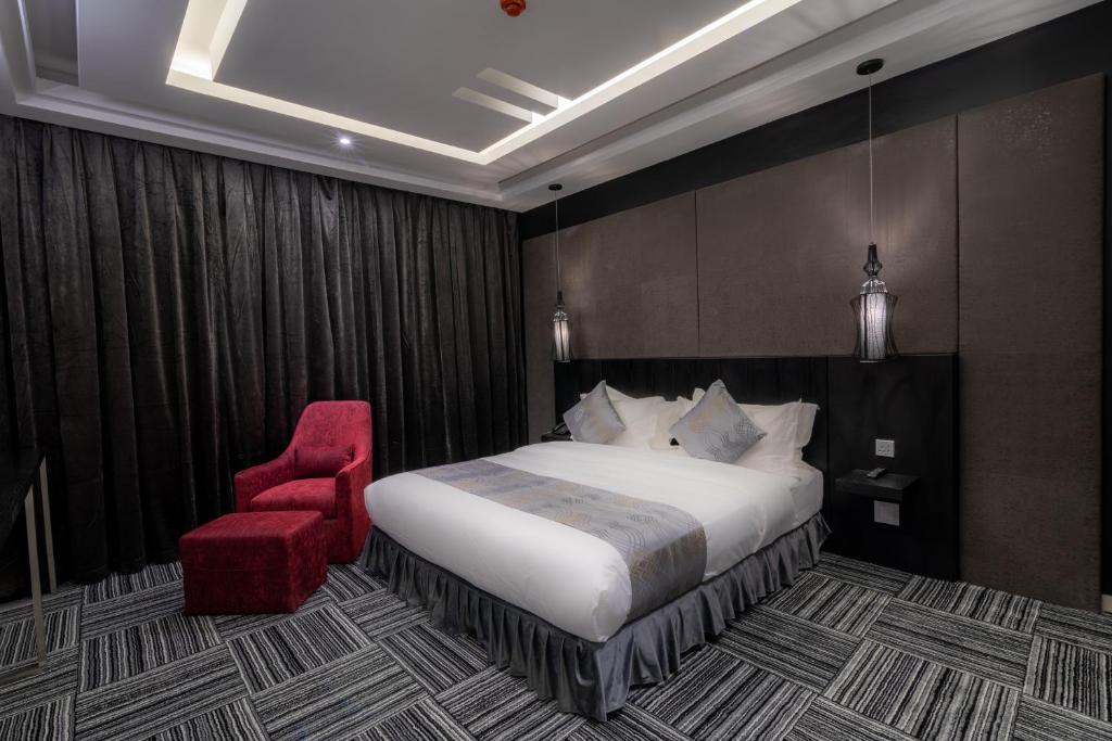 Postel nebo postele na pokoji v ubytování South Hotel Suites