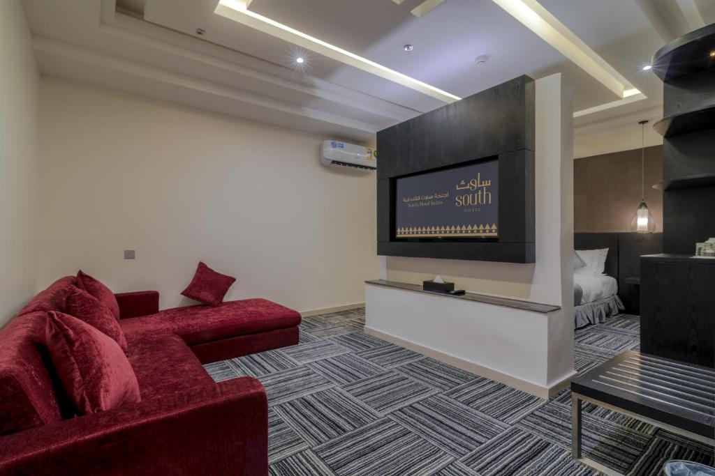TV a/nebo společenská místnost v ubytování South Hotel Suites