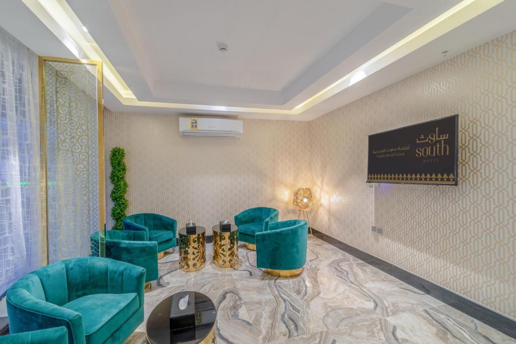 TV a/nebo společenská místnost v ubytování South Hotel Suites
