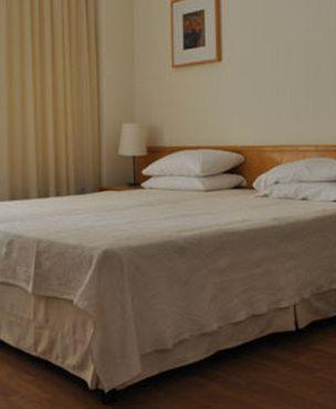 Postel nebo postele na pokoji v ubytování Miami Hotel