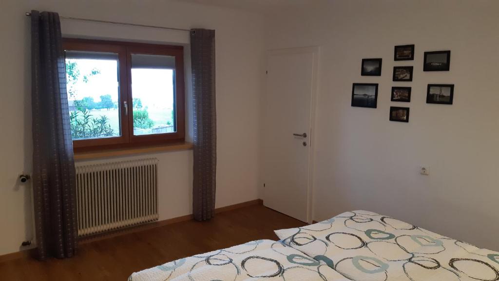 Postel nebo postele na pokoji v ubytování LaWie am Attersee