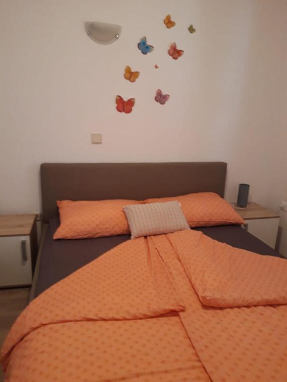 Postel nebo postele na pokoji v ubytování Apartments Petrovic