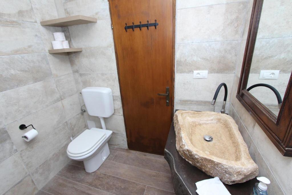 Kúpeľňa v ubytovaní Apartments Midea 2