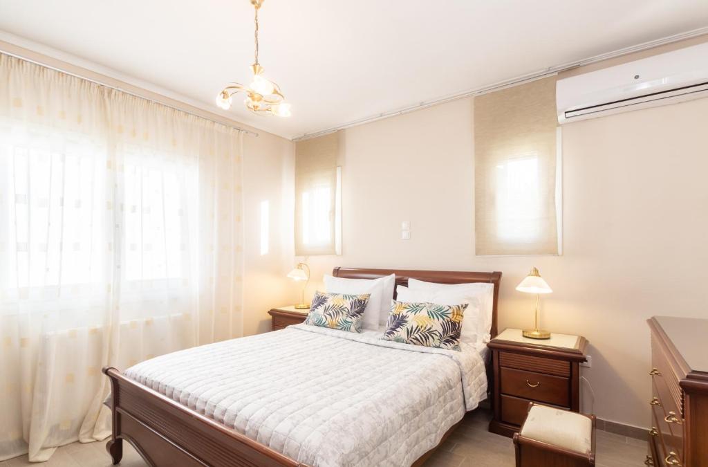 Łóżko lub łóżka w pokoju w obiekcie Diamante Beachfront Suites