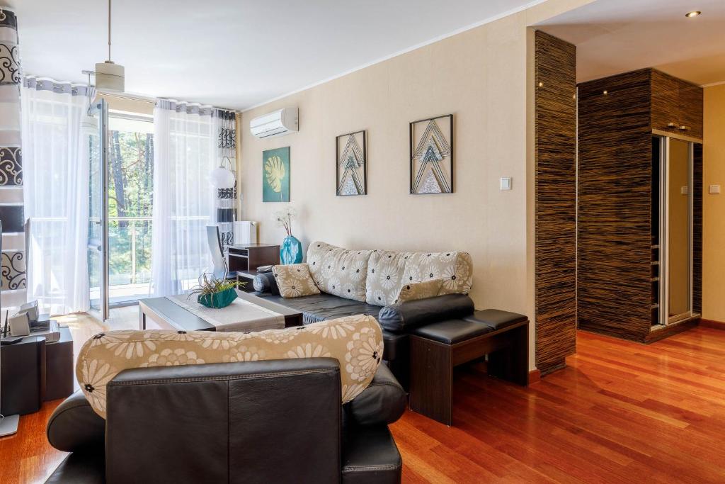 Posedenie v ubytovaní Apartament w Willi Woda w Juracie