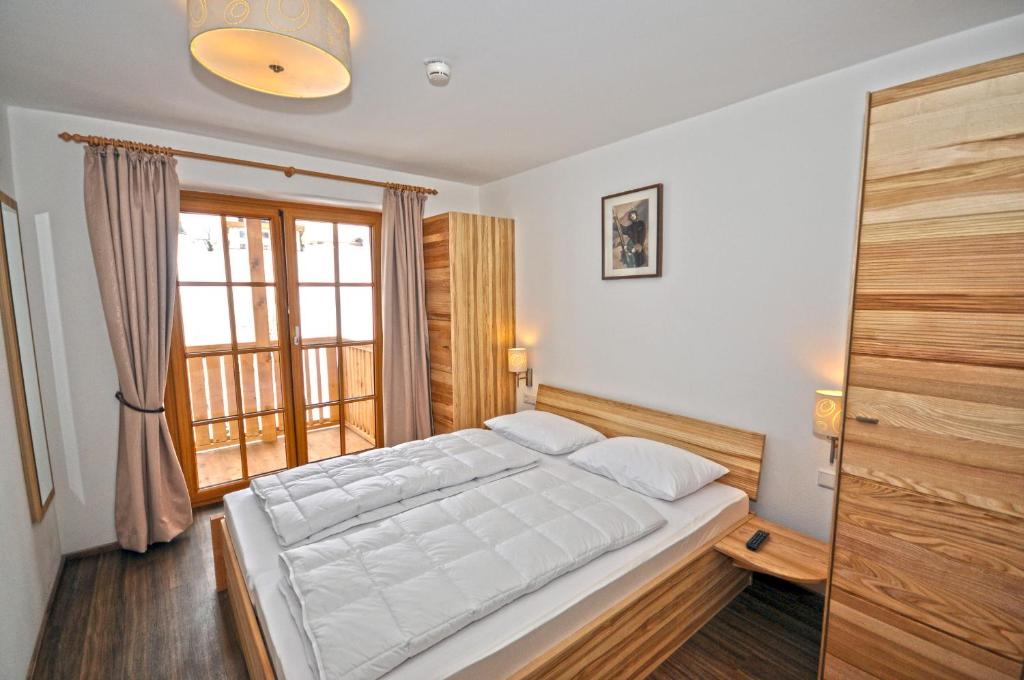 Posteľ alebo postele v izbe v ubytovaní Appartementhaus Kristall incl Joker Card by All in One Apartments