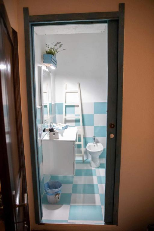 Koupelna v ubytování Rooms Romangia