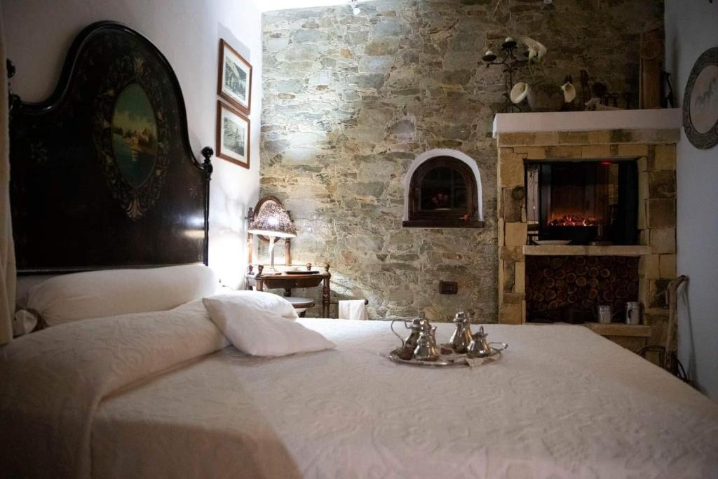 Postel nebo postele na pokoji v ubytování Rooms Romangia