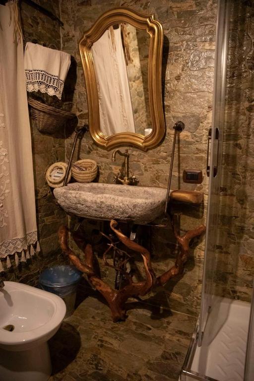 Koupelna v ubytování Rooms Romangia