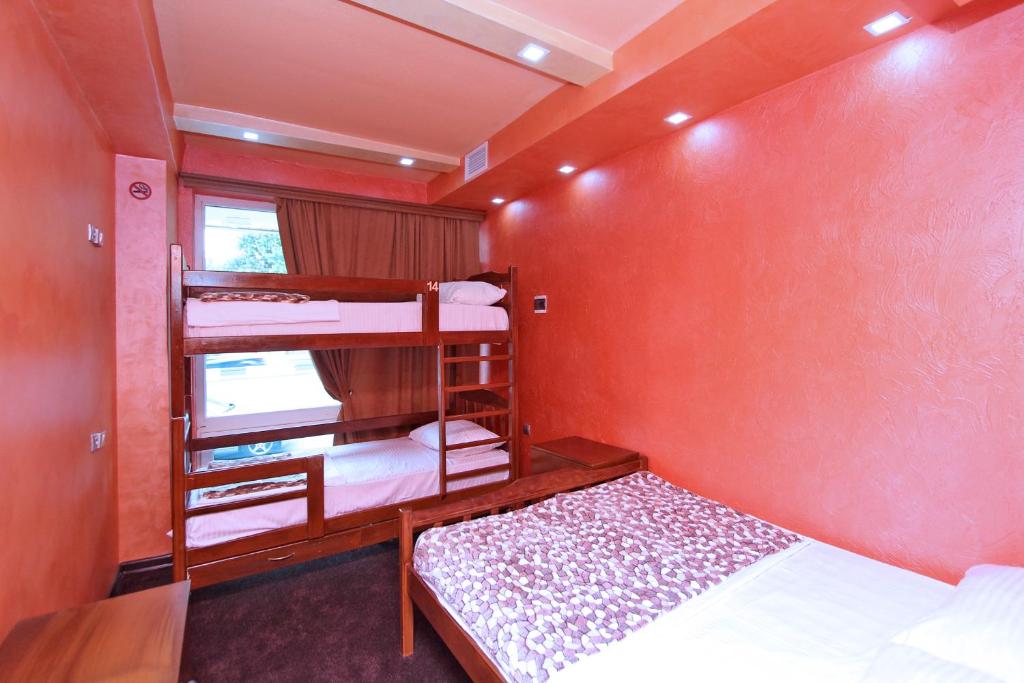 Postel nebo postele na pokoji v ubytování HOTEL N1