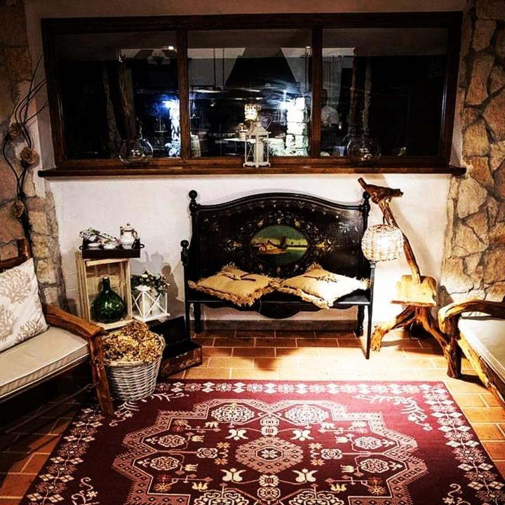 Posezení v ubytování Rooms Romangia
