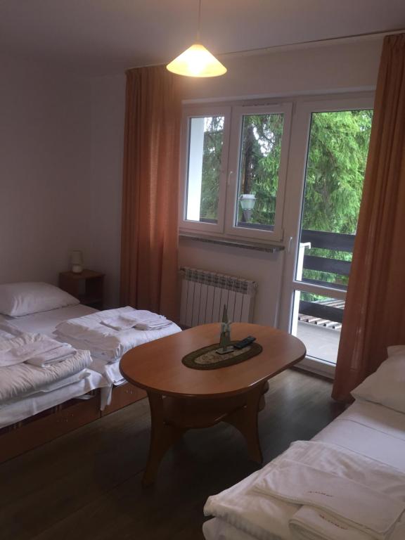 Postel nebo postele na pokoji v ubytování Willa MARANT