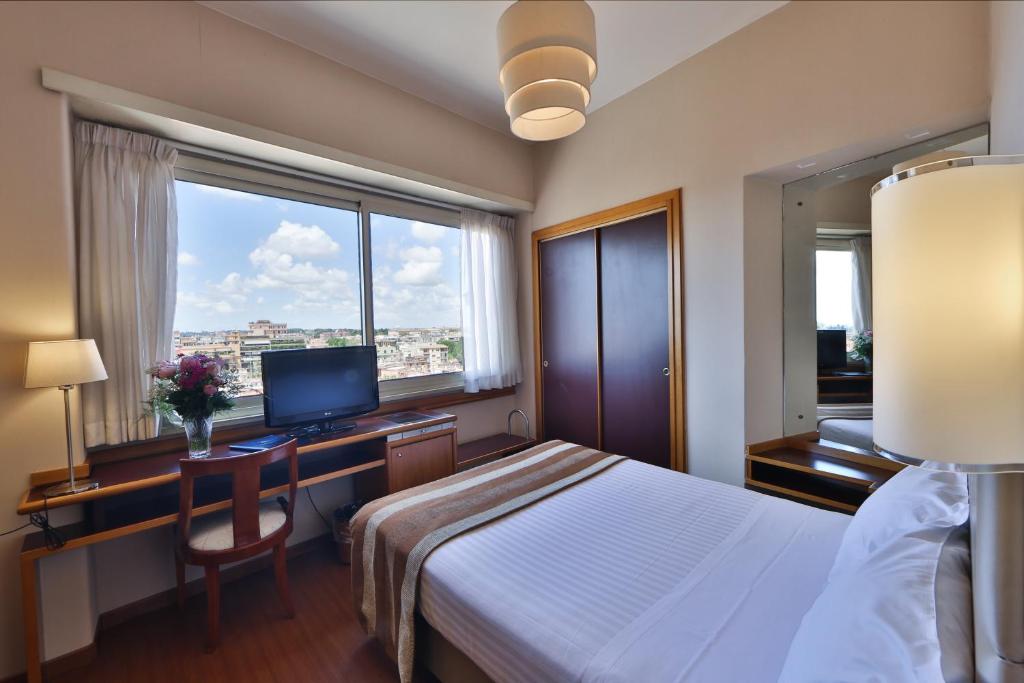 Postel nebo postele na pokoji v ubytování Best Western Hotel Piccadilly