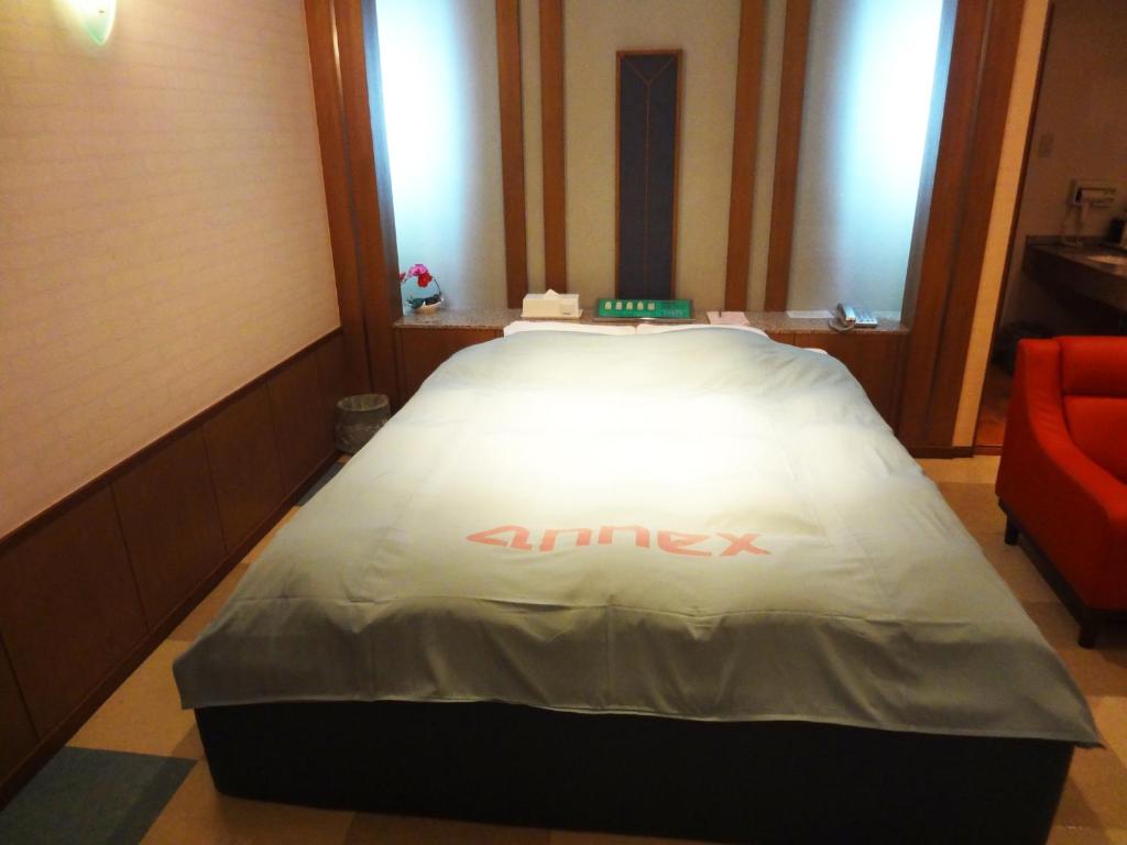 Postel nebo postele na pokoji v ubytování アネックスたまゆ 大人専用