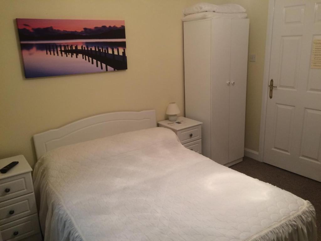 Postel nebo postele na pokoji v ubytování Ard Eoinin Spiddal B&B