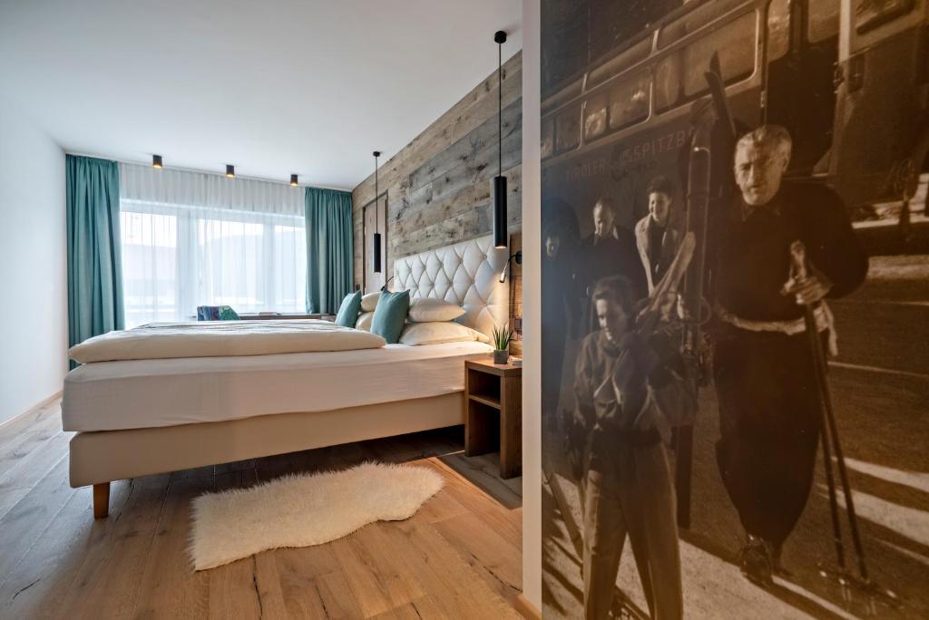 Postel nebo postele na pokoji v ubytování Hotel Stern