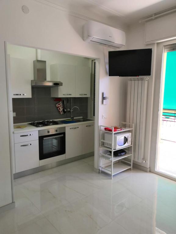 A kitchen or kitchenette at A Casa Vostra