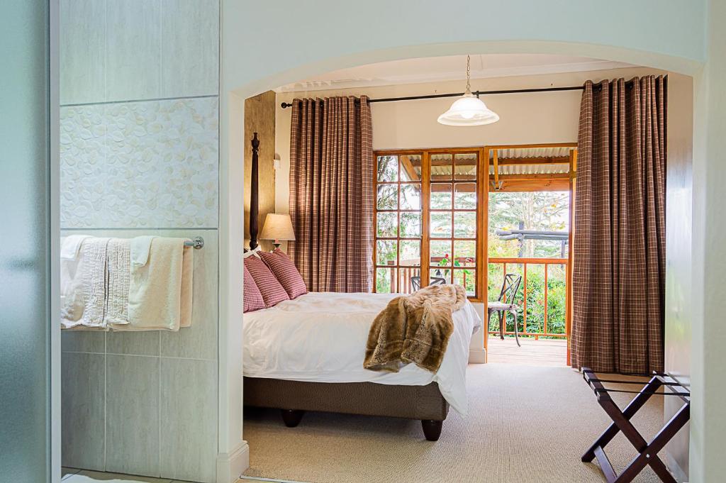 Letto o letti in una camera di Glen Ormond Country House
