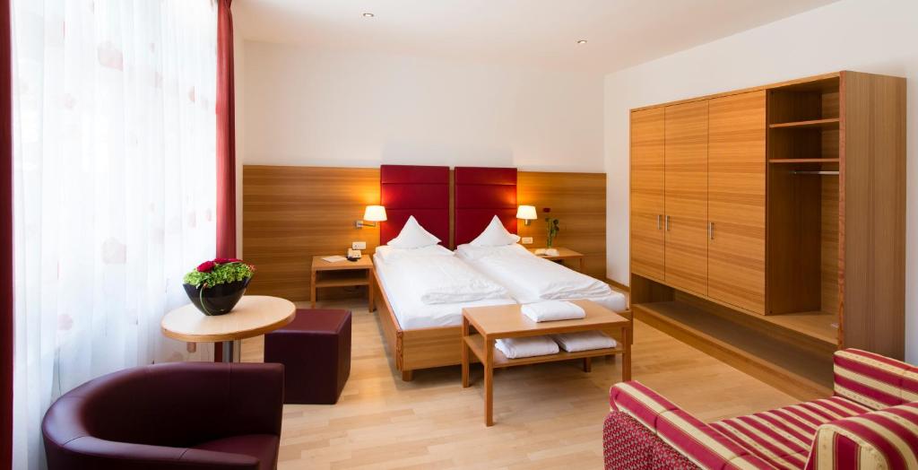 Postel nebo postele na pokoji v ubytování Hotel Kolping