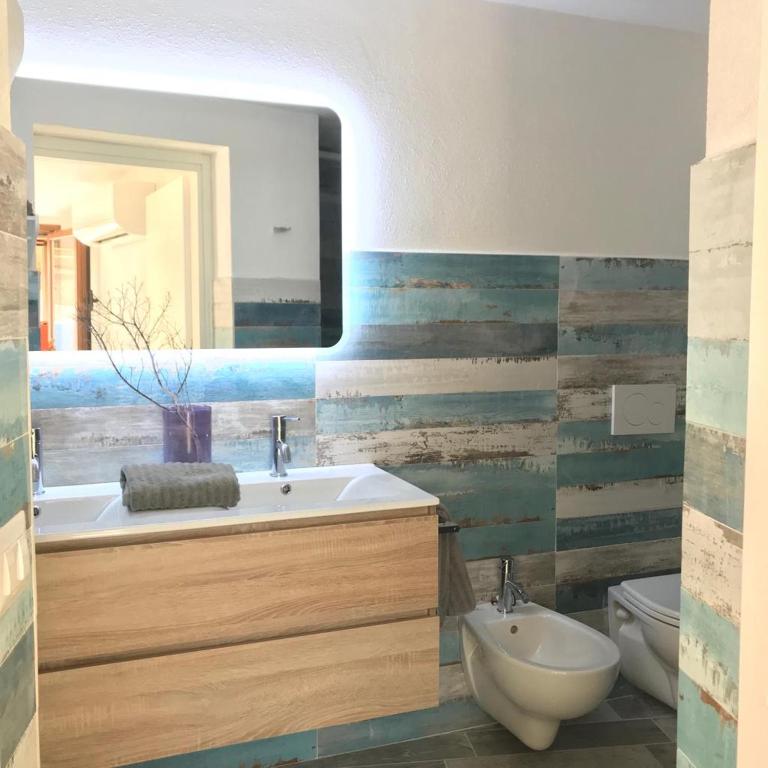 A bathroom at Villa nel villaggio Costa Caddu San Teodoro