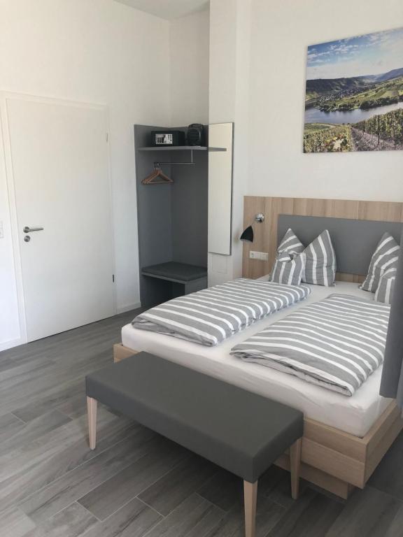 Postel nebo postele na pokoji v ubytování Hotel Lumi