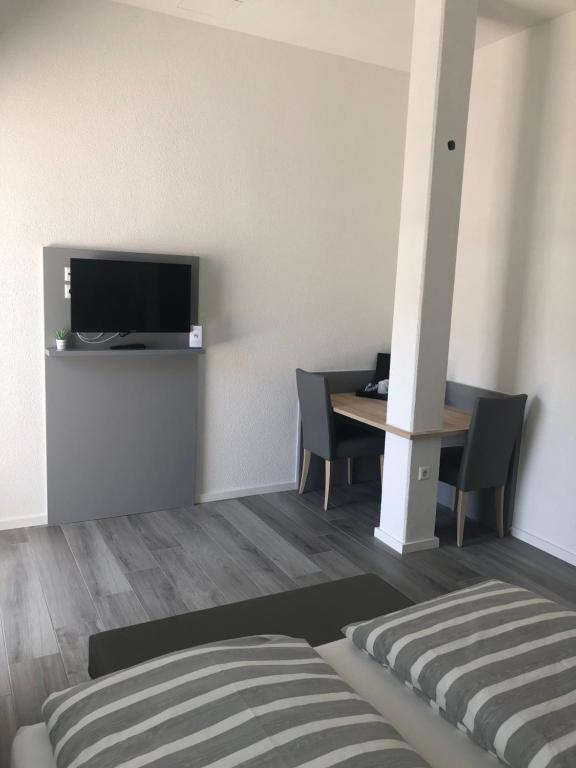 TV a/nebo společenská místnost v ubytování Hotel Lumi