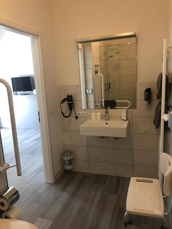 Koupelna v ubytování Hotel Lumi