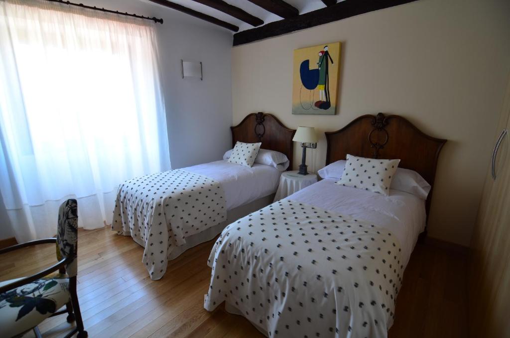Postel nebo postele na pokoji v ubytování Casa de la Cadena