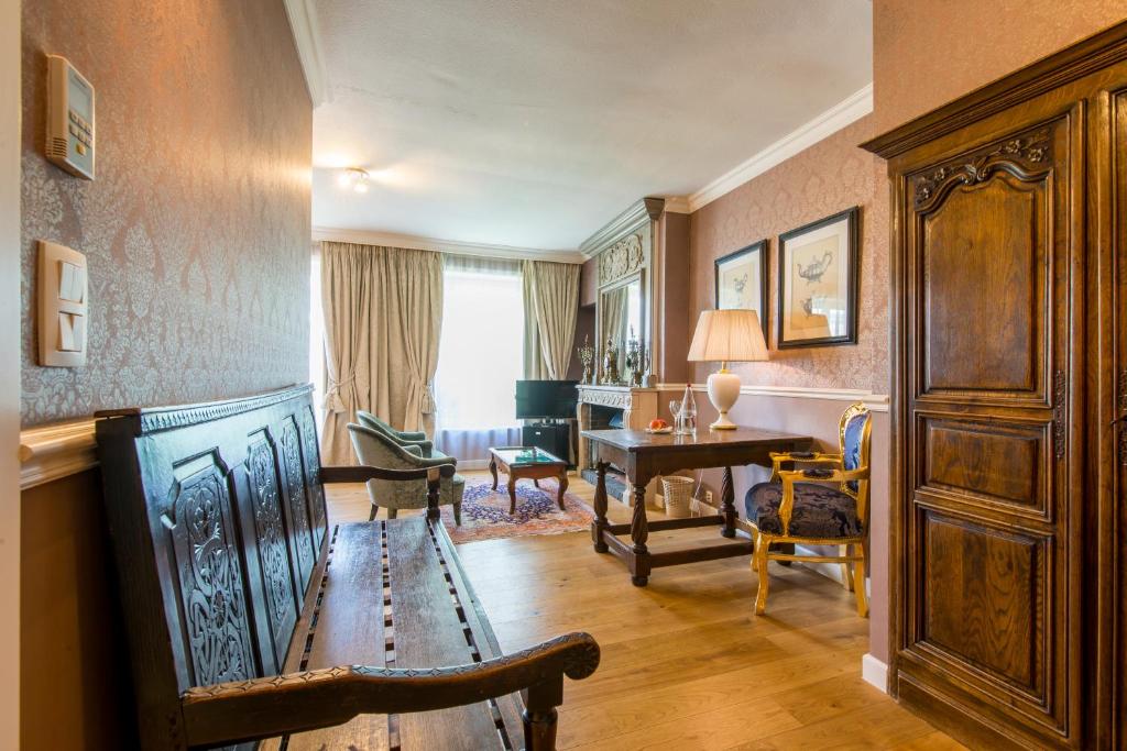Posezení v ubytování Boutique Hotel Die Swaene
