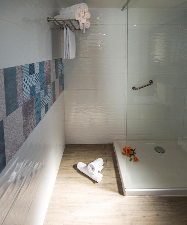 Ванная комната в Aparthotel Ona Aucanada