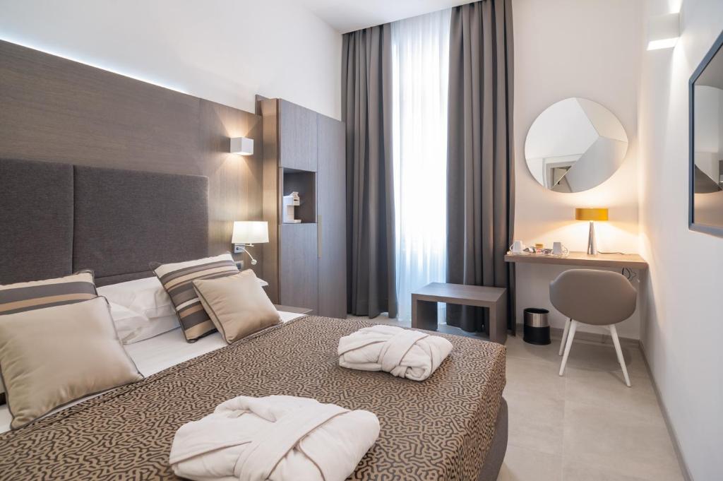 Posteľ alebo postele v izbe v ubytovaní Wellness Home Rome