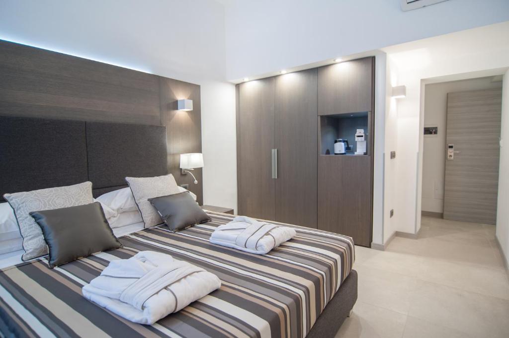 Posteľ alebo postele v izbe v ubytovaní Wellness Home Rome