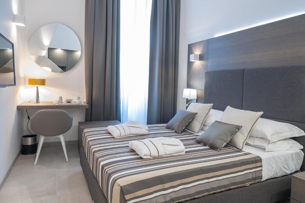 Posteľ alebo postele v izbe v ubytovaní Wellness Home Rome
