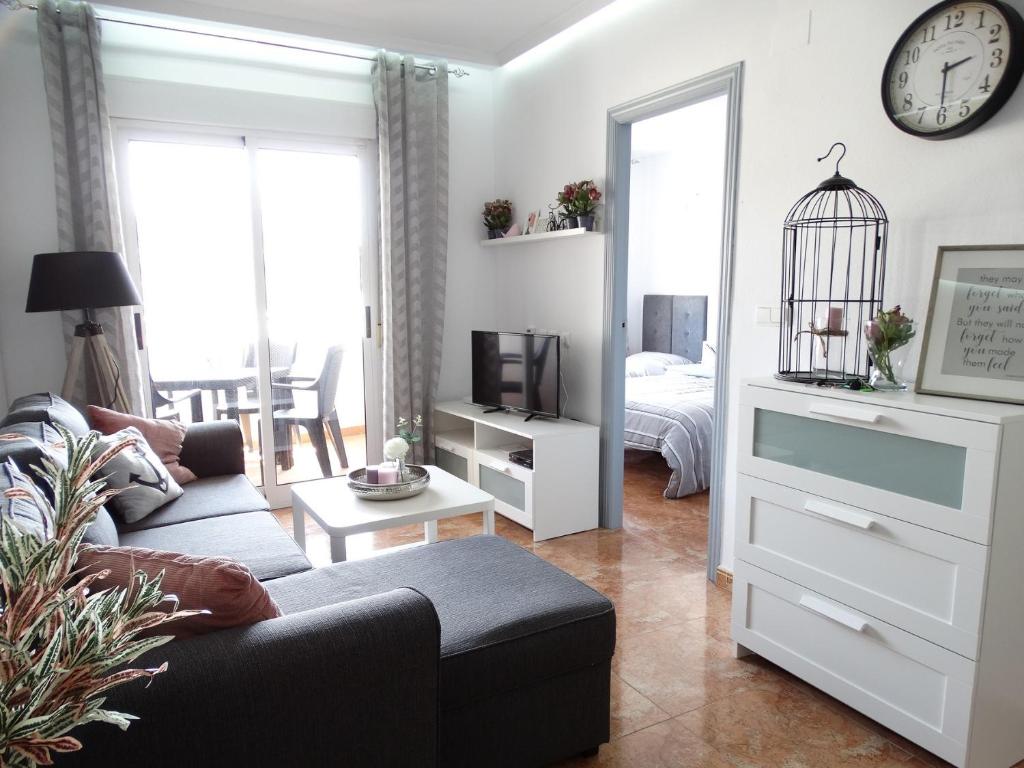 Televízia a/alebo spoločenská miestnosť v ubytovaní Apartamento Adrianna, Tomillo, Torrevieja