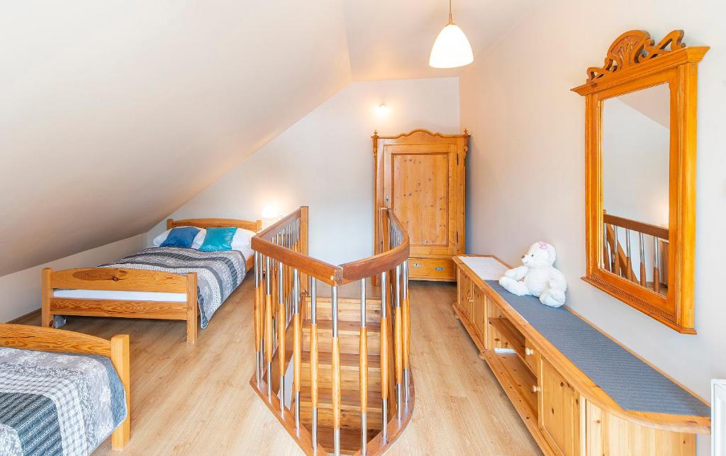 Postel nebo postele na pokoji v ubytování Apartamenty Sun & Ski Willa Nadrzeczna 2B centrum