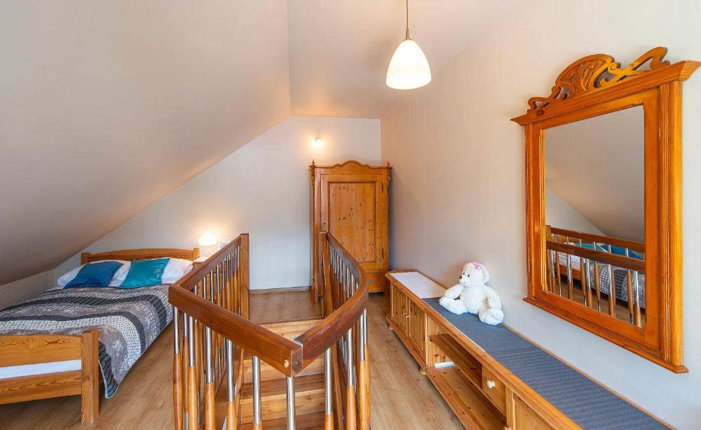 Postel nebo postele na pokoji v ubytování Apartamenty Sun & Ski Willa Nadrzeczna 2B centrum