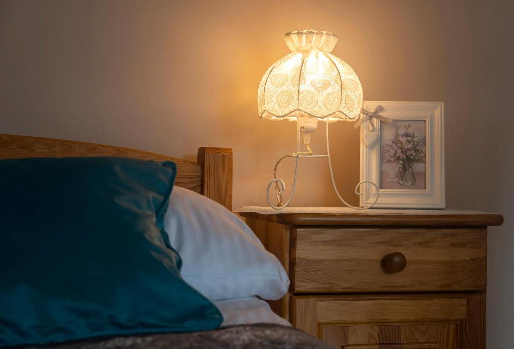 Postel nebo postele na pokoji v ubytování Apartamenty Sun & Ski Willa Nadrzeczna 2B centrum