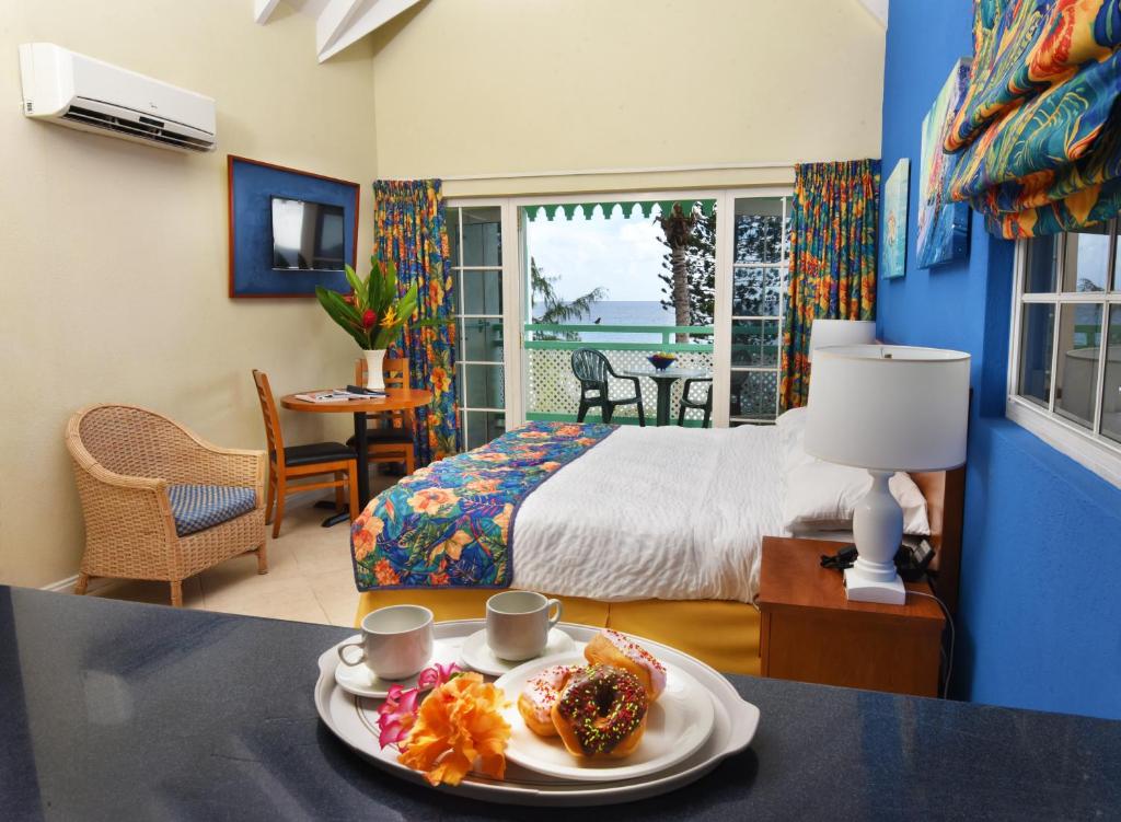 Postel nebo postele na pokoji v ubytování Blue Orchids Beach Hotel