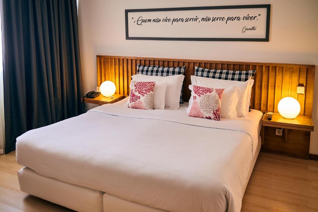 Кровать или кровати в номере Hotel Praia Marina by RIDAN Hotels