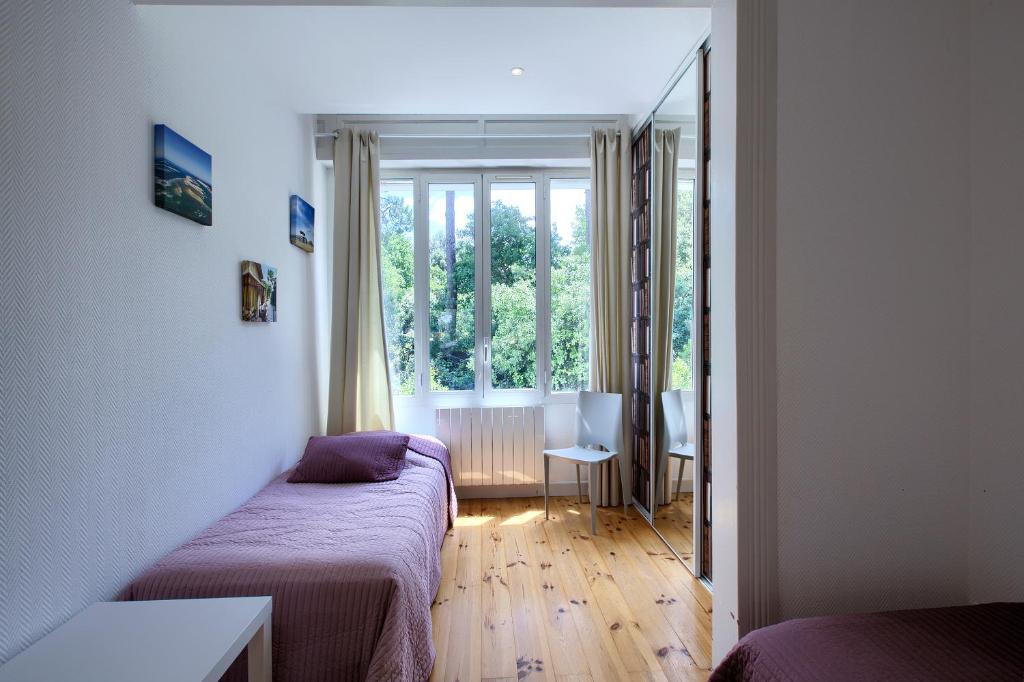 Postel nebo postele na pokoji v ubytování Appartement Pyla Les Cèdres
