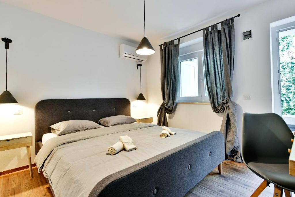 Postel nebo postele na pokoji v ubytování Pikarin rooms B&B