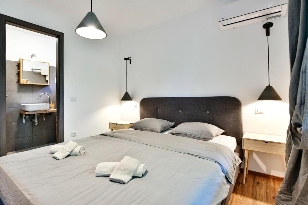 Postel nebo postele na pokoji v ubytování Pikarin rooms B&B