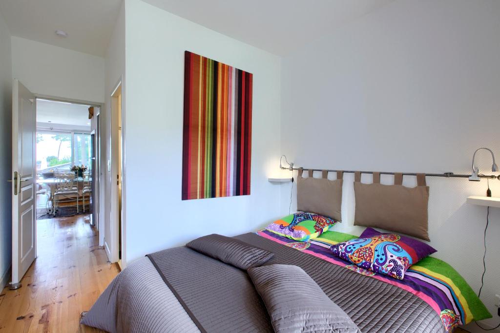 Postel nebo postele na pokoji v ubytování Appartement Pyla Les Cèdres
