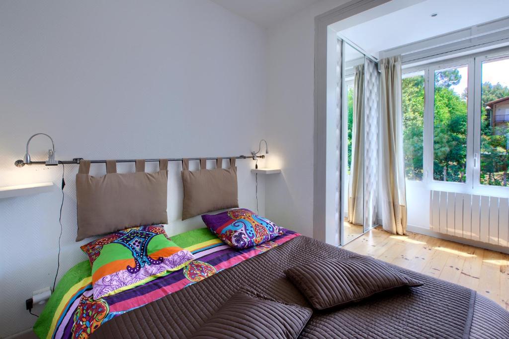 Postel nebo postele na pokoji v ubytování Appartement Pyla Les Cèdres