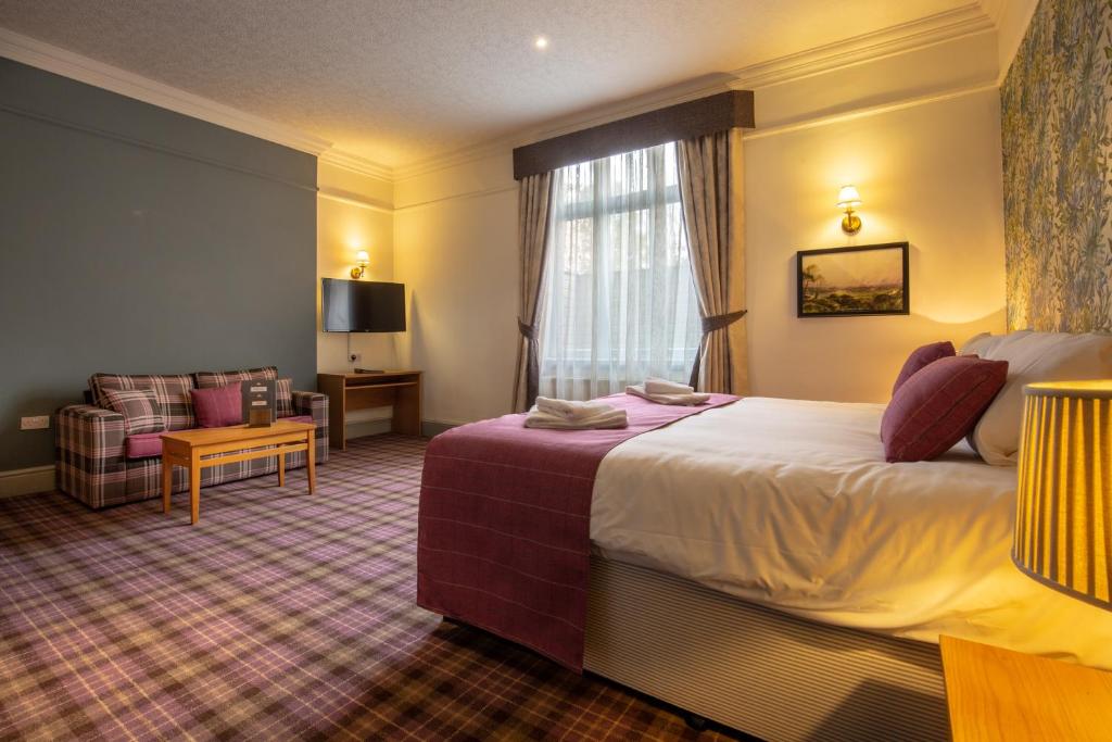 Woodthorpe Hotel房間的床