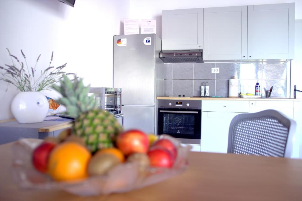 Kuchyňa alebo kuchynka v ubytovaní Studio apartment Gray