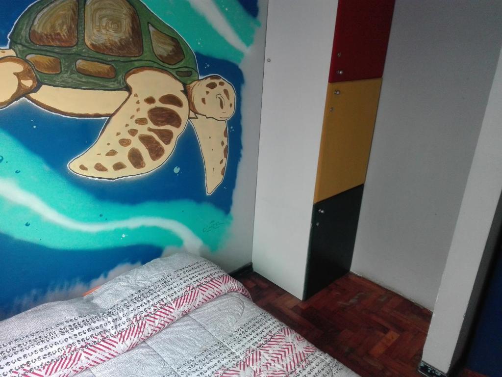 Postel nebo postele na pokoji v ubytování La Casa Azul Hostel